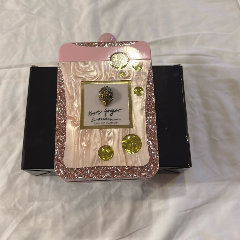 Perfume bottle clutch purse